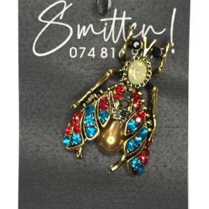 Vibrant insect brooch