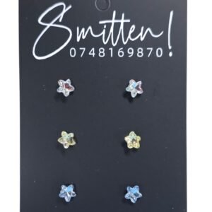 Alternative view of Three pairs of star-shaped crystal stud earrings.