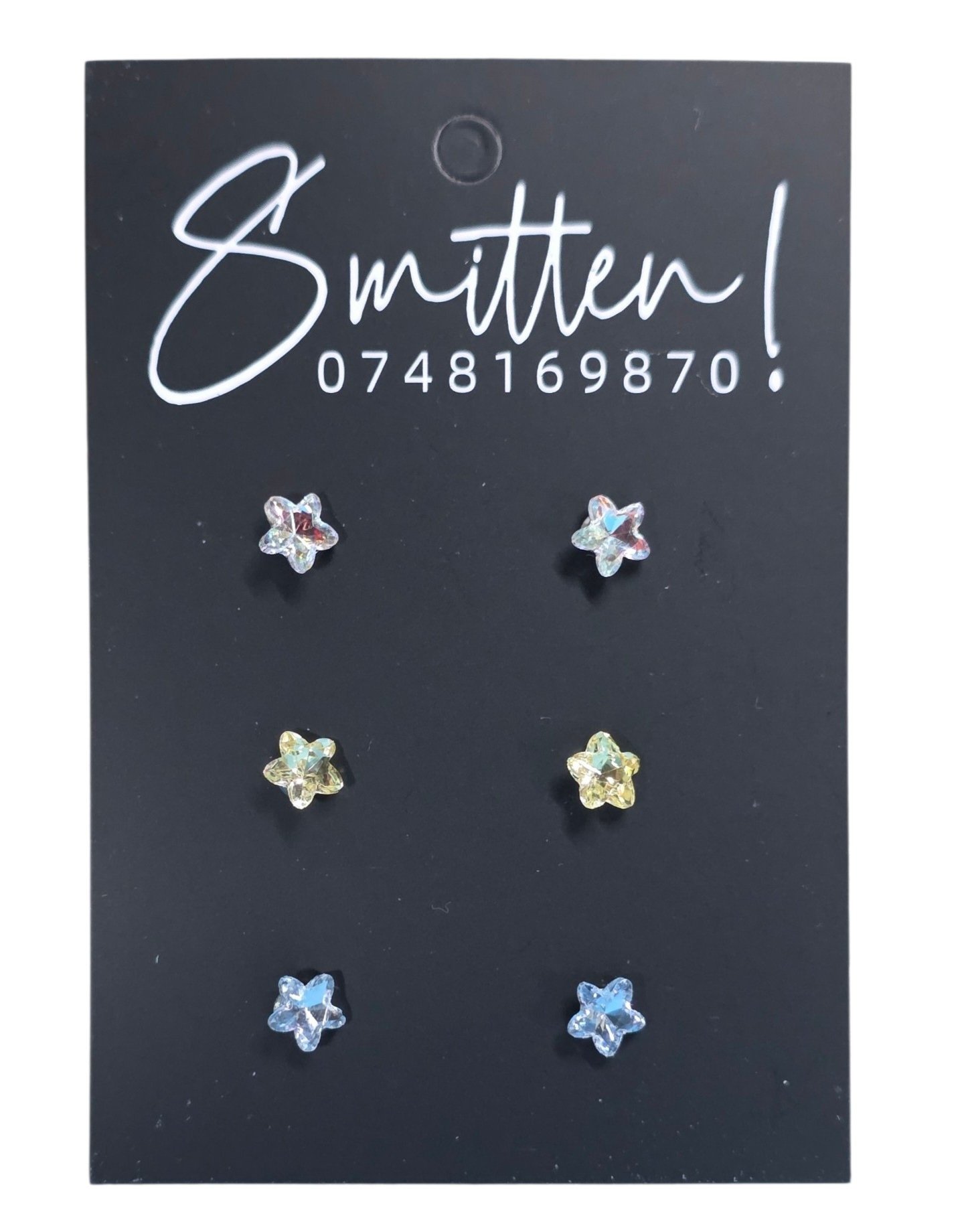 Three pairs of star-shaped crystal stud earrings. - Image 2