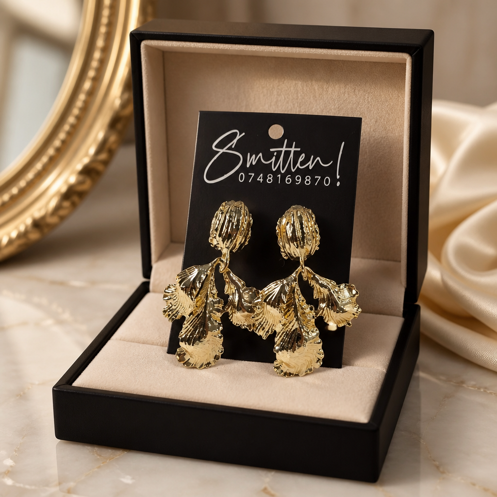 Gold-toned leaf statement earrings
