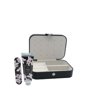 A sleek, rectangular travel jewelry organizer case